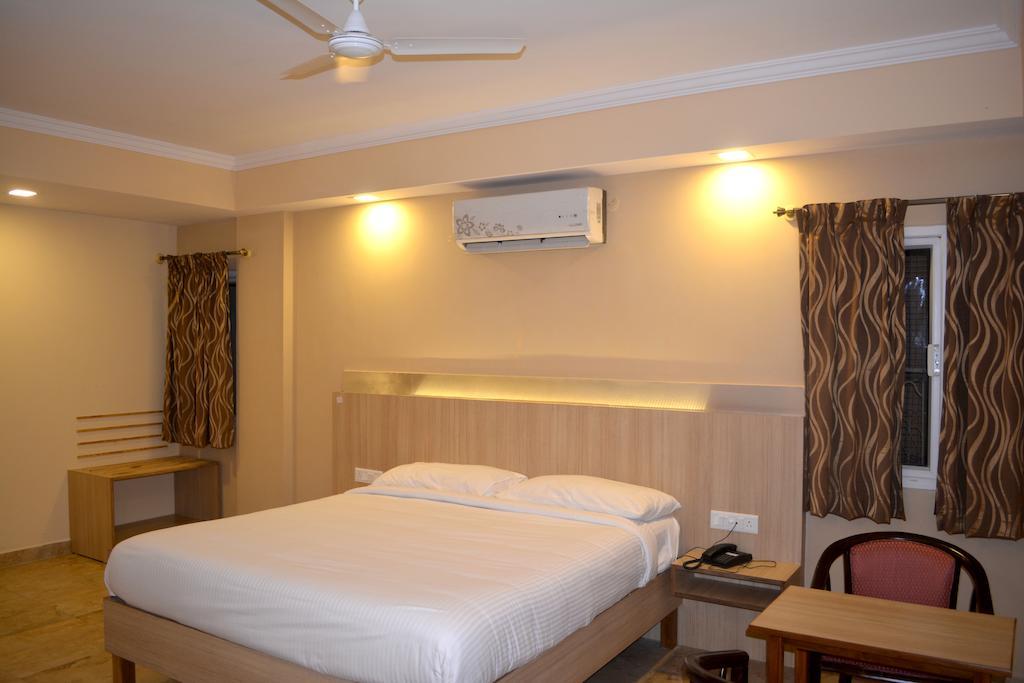 Hotel Royal Opera Bangalore Quarto foto